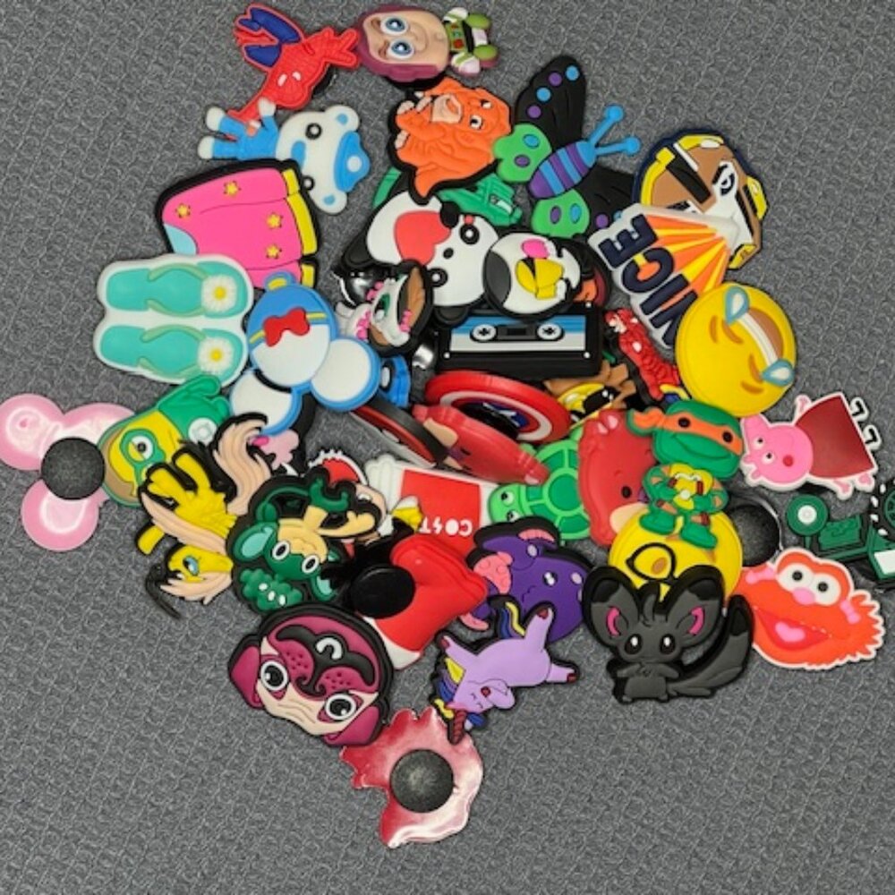 NIB Assorted Shoe Charms - set of 45